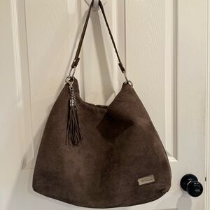 Brand new suede like material tote with charm
